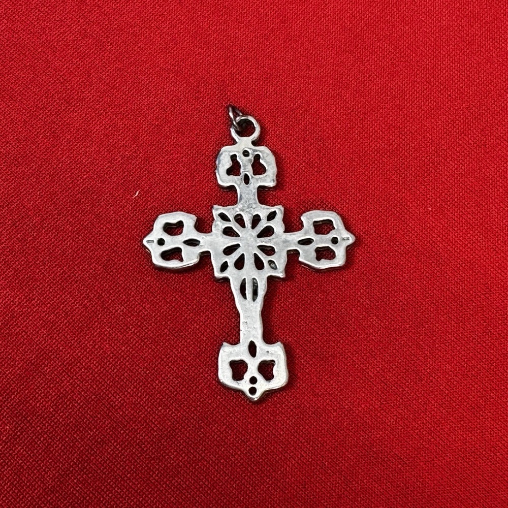 Silver Tone Cross Pendant With Intricate Open Cuts